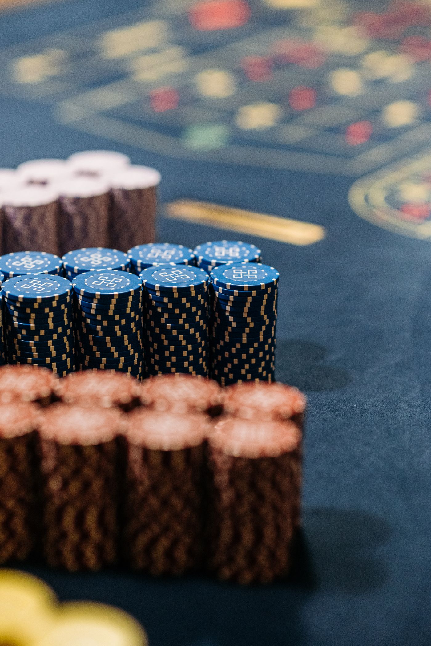 Casino chips and roulette-table details, used as illustrative photography